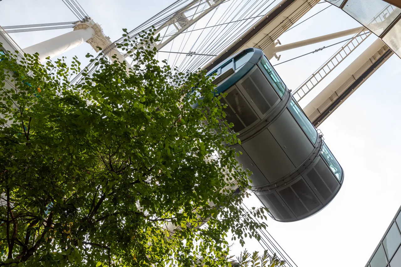 Close-up of a single glass capsule on the Singapore Flyer